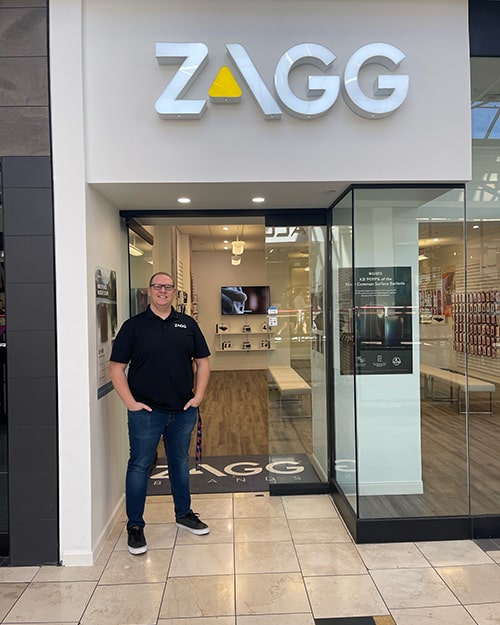 ZAGG franchisee Nathan Whitlock standing in front of ZAGG Penn Square