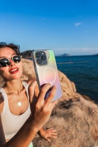 woman taking selfie on iphone 