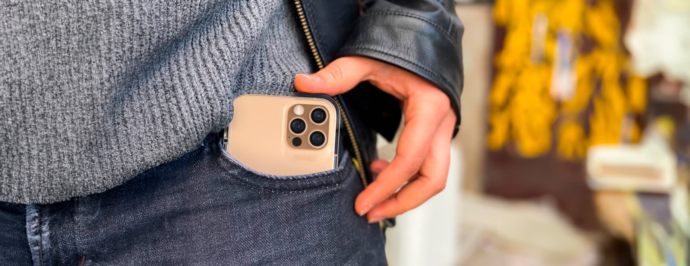 gentleman putting iphone into his front pocket