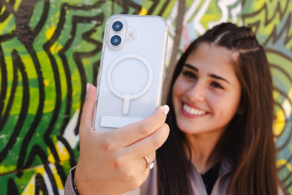 woman holding iphone close-up