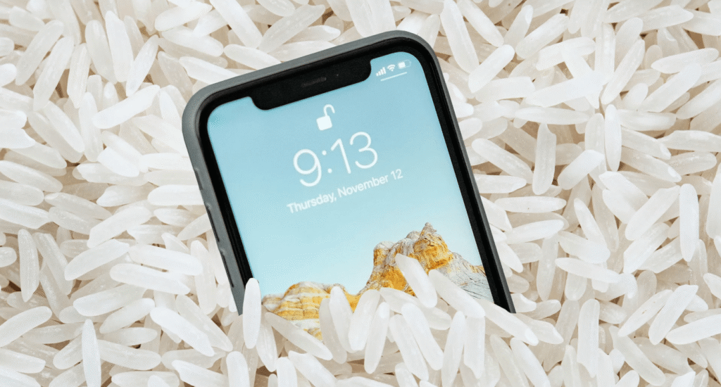 iphone sitting in rice