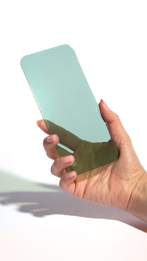 someone holding a screen protector